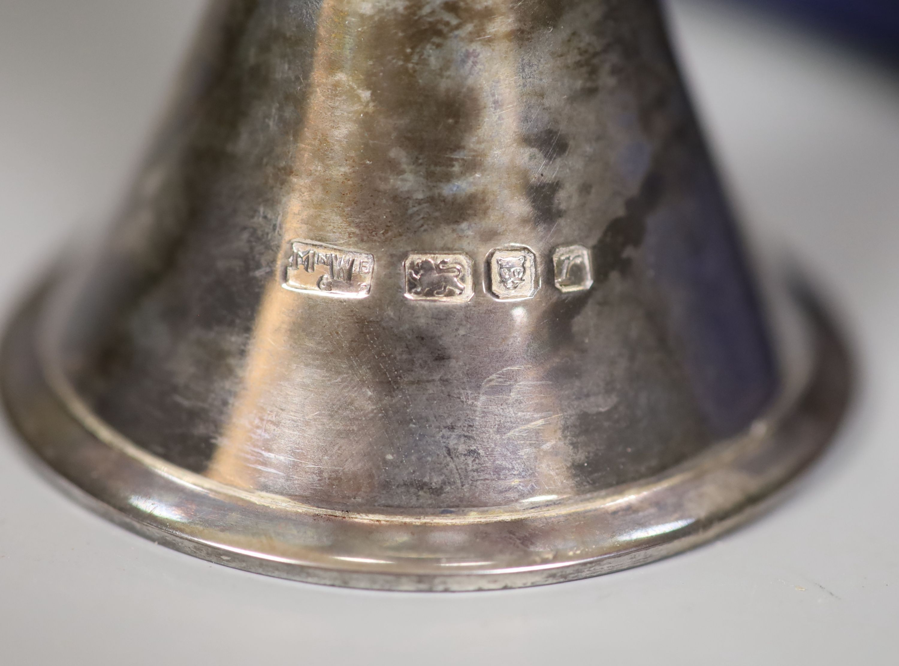 A Mappin and Webb silver and silver gilt goblet to commemorate “Silver Wedding Queen and Duke of Edinburgh 1947-1972” (London 1972), 14.4cm boxed together with Asprey silver ashtray with matchbox holder, gross 10oz.